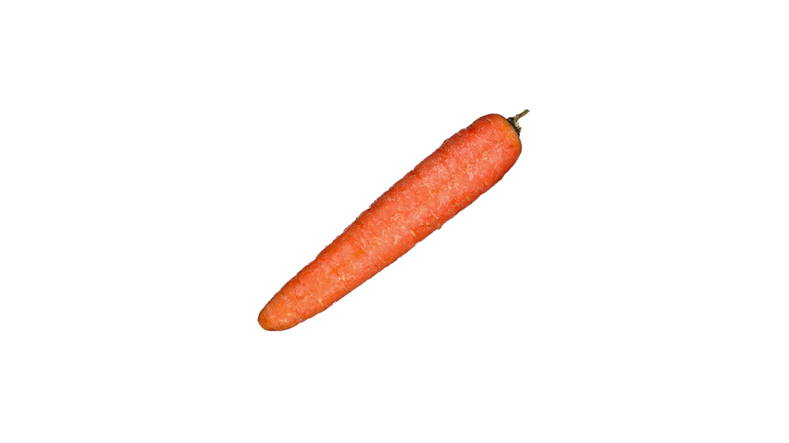 Deliziosa carota arancione senza foglie su sfondo bianco