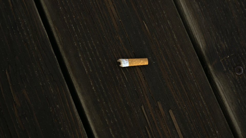 Movimento a mozzicone di sigaretta sdraiato sulla passerella di legno