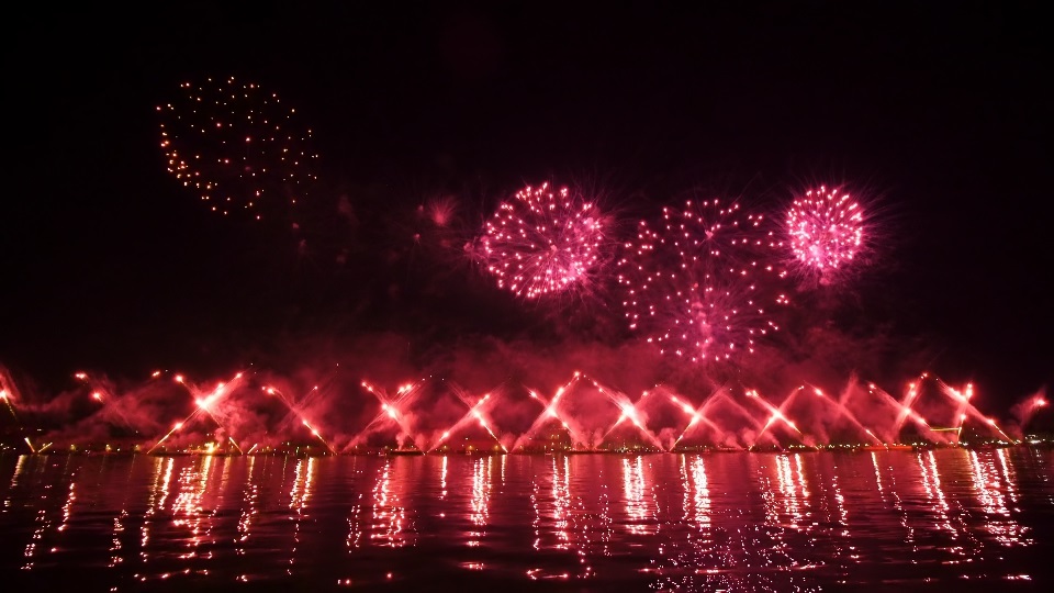 Red fireworks launched synchronically on Feast of Redeemer