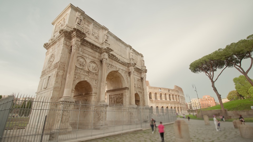 Ancient Triumphal arch built near Colosseum in old Rome