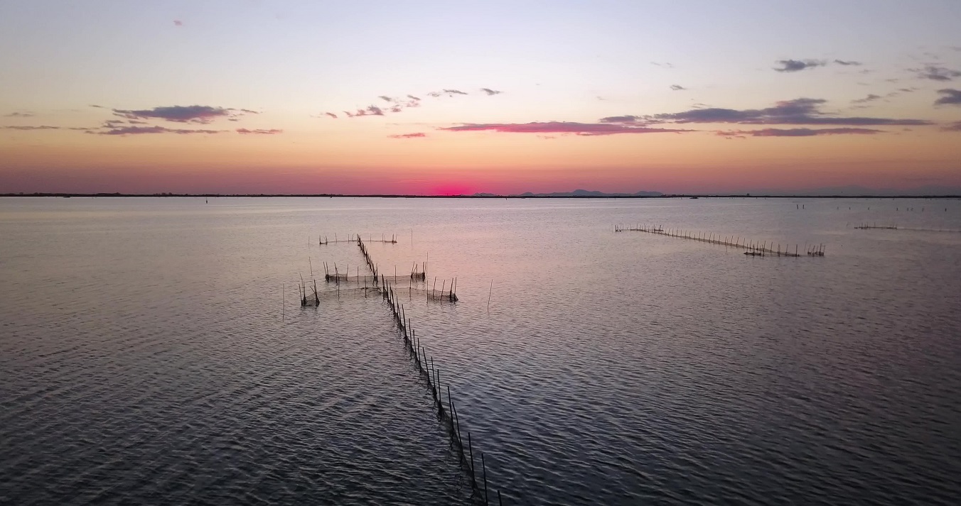 Fishing nets in the Venetian lagoon at sunset