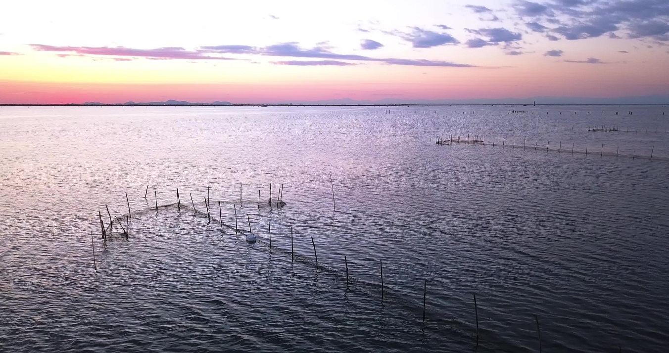 Aerial shot of the lake with fishing nets