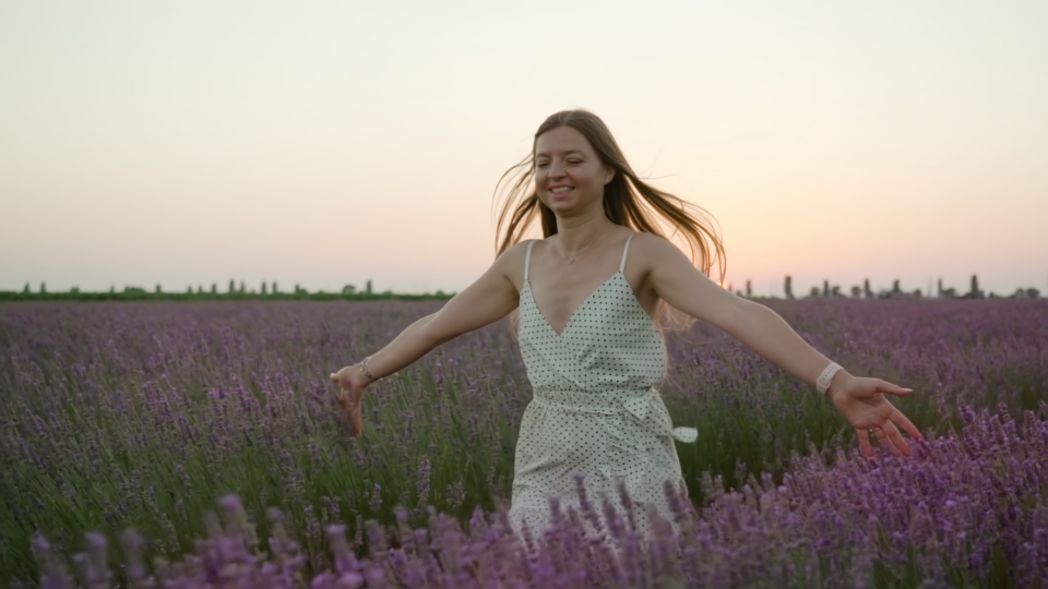 Woman runs on the lavender field
