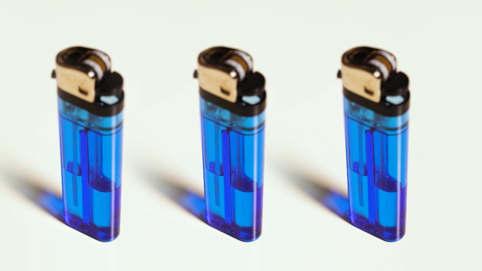 Blue lighters rotate on a white background